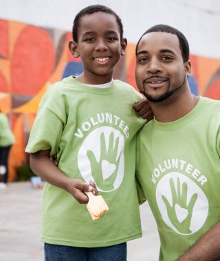 Father and son volunteering