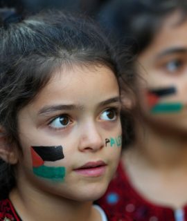 LONDON, ENGLAND - OCTOBER 9: Young girls with face make-up on showing the Palestinian flag take part in a demonstration in support of Palestine at the Israeli Embassy on October 9, 2023 in London, England. Protesters are demanding that Israel puts an end to its cycle of violence against the Palestinian people. This call to action comes after the Israel Defense Forces initiated air strikes on Gaza late Saturday in response to a surprise attack on Israel from the Palestinian militant group Hamas. (Photo by Carl Court/Getty Images)